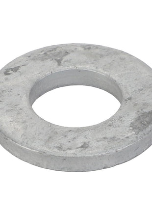 The AGCO | Washer - Acp0705070, a product by AGCO, is a metallic flat washer featuring a circular outer edge and a central hole, designed to distribute the load of a threaded fastener.