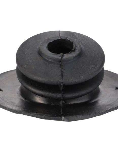 The AGCO | RUBBER SHIELD - V30930600 from AGCO is a black rubber grommet featuring a central hole and a flanged base. No current product description information is available.
