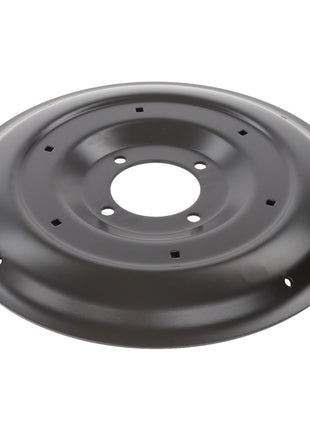 A black circular metal disc from AGCO, model Skid - Fel140735, features several small square and round holes near the center and along the edge.