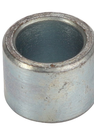 The AGCO Spacer - Acw1043760 is a cylindrical metal component with a hollow center, and it features a slightly weathered surface. Unfortunately, there is no additional product description information available at this time.