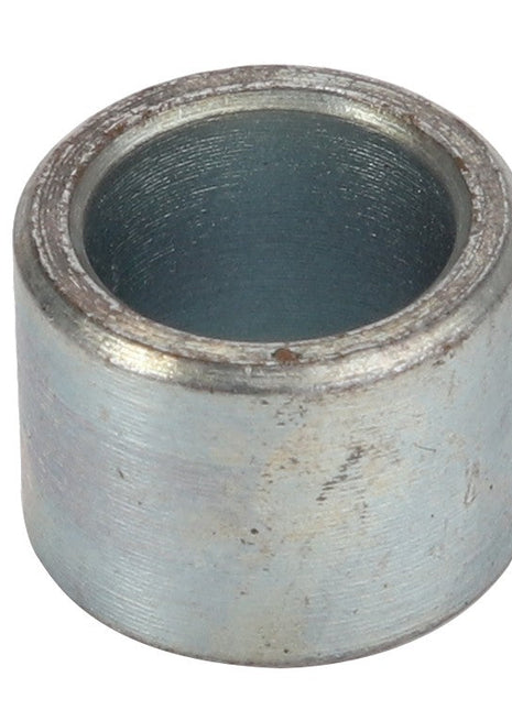 The AGCO Spacer - Acw1043760 is a cylindrical metal component with a hollow center, and it features a slightly weathered surface. Unfortunately, there is no additional product description information available at this time.