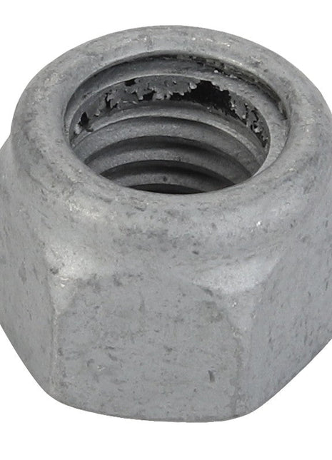 Close-up of the AGCO Hex Top Lock Nut (Acx2967660) with a threaded interior. The surface has a slightly rough texture and shows minor wear. No current product description information is available.