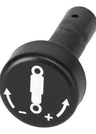 The AGCO | Knob - Acw1028600 from AGCO is a sleek black knob featuring a white graphic with two directional arrows, symbols for plus and minus, and a central figure.