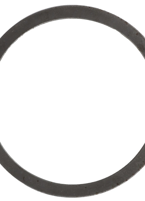 A close-up of the AGCO Shim - F380303020354, featuring a metallic circular shape with a central hole.