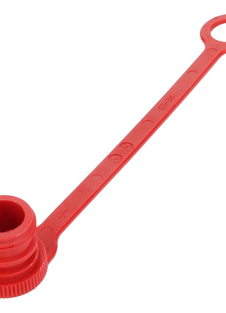 Introducing the AGCO CAP - D45147800, a red plastic dust cap with a ring handle, perfect for covering and protecting the ends of various fittings. Featuring a threaded section and a flexible strap connected to the ring, this durable accessory ensures your equipment stays clean and uncontaminated. Brought to you by AGCO.