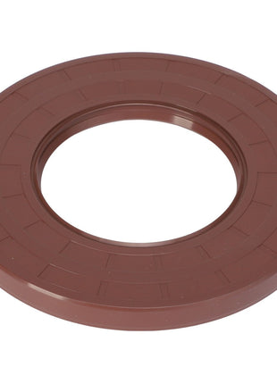 Introducing the AGCO | LIP SEAL - ACP0287670, a circular brown plastic ring with a smooth outer surface and a hollow center, resembling a large washer. For further details or ordering information, please contact our support team.