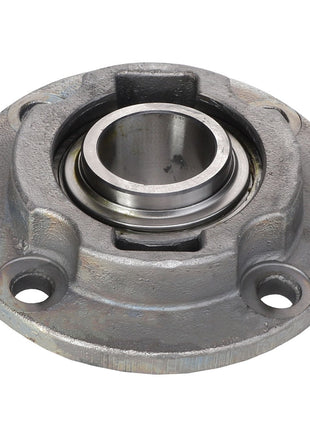 A close-up of the AGCO Bearing Housing - Acx2908640, featuring a round central opening and several mounting holes. This industrial metal component embodies the quality associated with the AGCO brand.