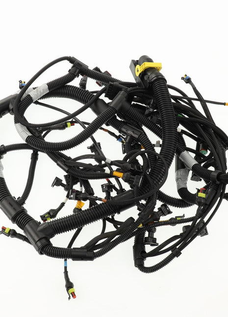 The AGCO Harness - Acw0169110, featuring numerous black cables, connectors, and distinctive yellow accents, is displayed against a stark white backdrop.