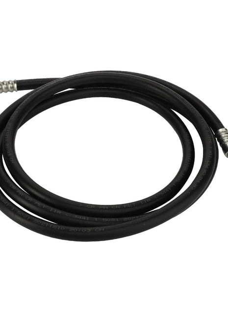 The AGCO | High Press Hose - Acx354273A, a premium black rubber hose from AGCO, features integrated metal connectors on each end for easy attachment to fluid or gas systems. It is neatly coiled in a single loop for convenient use.