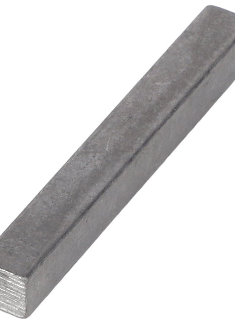 A metal square rod with smooth surfaces and a dull finish, specifically the AGCO SQUARE KEY - AG716242 by AGCO, is placed at an angle against a plain white background. No current product description information is available.