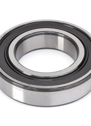 The AGCO Ball Bearing - F281108220010 is a metal ball bearing with an inner and outer ring, designed to handle radial and axial loads, and features a rubber seal on one side.