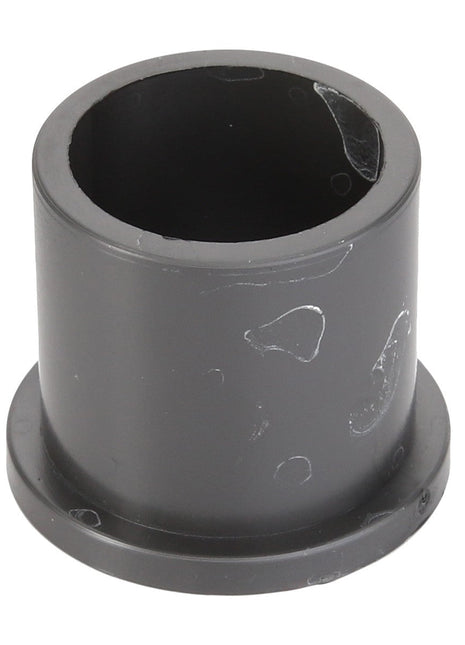 The AGCO BUSH - D43317000 is a black cylindrical plastic spacer featuring a flange at the base and slight surface markings.