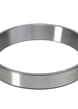 A metallic circular ring with a smooth, reflective surface placed against a plain white background. Product: AGCO | Bearing Cup - Acp0006950 by AGCO.