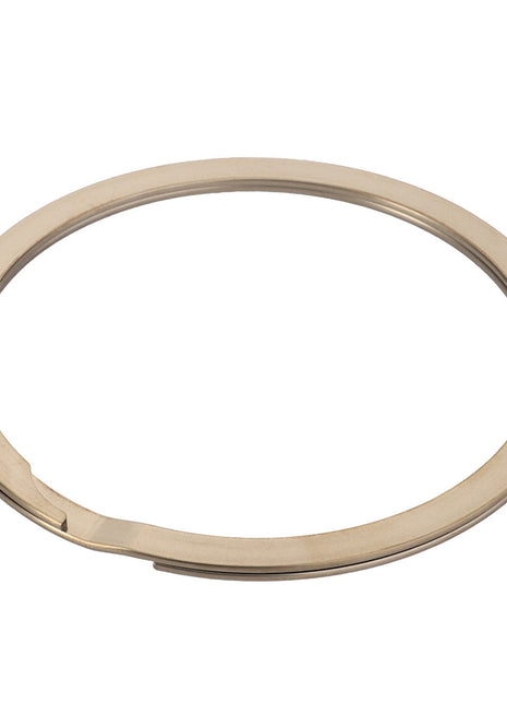 A sleek metallic circular AGCO Retaining Ring - Acx3194180, featuring a small gap on one side, is set against a plain white background.