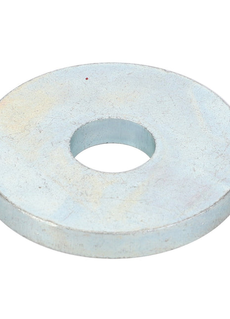 The AGCO | WASHER - D20400425 is a robust, flat, metallic washer with a precisely cut circular hole in the center.