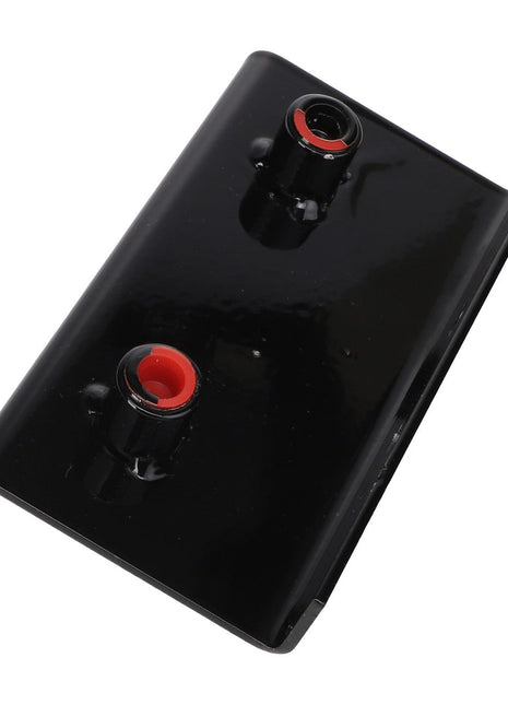 The AGCO MOUNTING BRACKET - AG331568 is a black, rectangular plastic part featuring two connectors with red rings on the surface. Currently, there is no additional product description information available for this item.