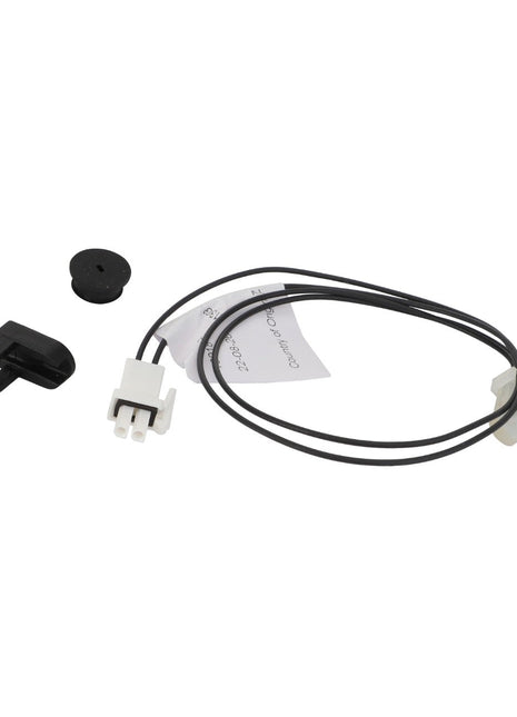 The AGCO Sensor Kit - Acp0649660, featuring a small electronic sensor with a black wire, white connector, and additional black plastic components, is displayed against a white background.