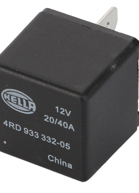 A black, cubic relay with the text "HELLA 12V 20/40A 4RD 933 332-05 China" printed on its surface. Designed for optimal integration, this component features metal prongs on one side for electrical connections and is part of the AGCO Parts Genuine Electrics lineup. The official product name is AGCO | Relay, 12 V 20/40 A - D45087700 from the brand AGCO.