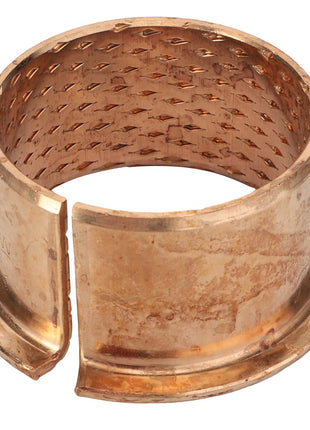 The AGCO Flange Bushing - Fel150643 by AGCO features a metallic, cylindrical design with a flange, complemented by a textured inner surface and an open slit along its side.