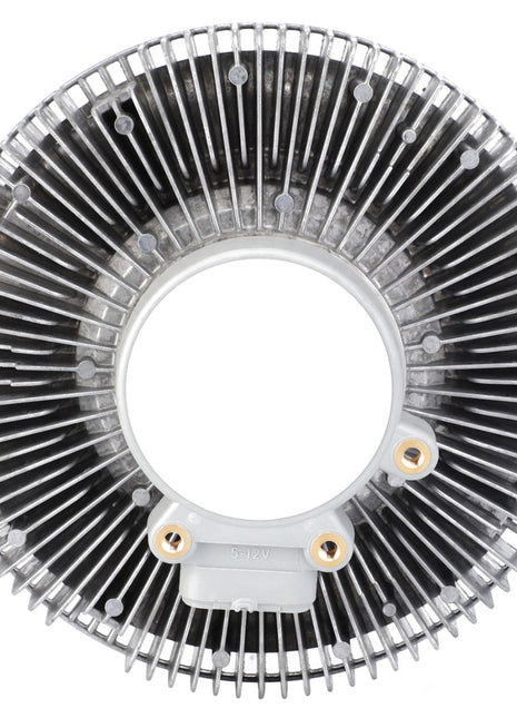 Close-up of the AGCO | Clutch - 4282824M1, featuring a round metal heatsink with numerous radial fins and a central circular opening. This AGCO-branded heatsink is designed for thermal management of electronic components.