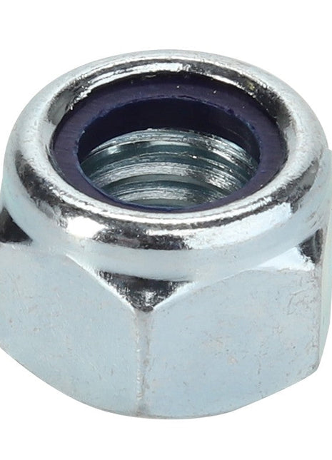 Close-up of the AGCO NUT - D41092600, a hexagonal metal nut featuring internal threading and a distinctive dark ring on the upper edge.