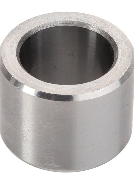 A close-up of the AGCO | Bush - Acp0383380, a metal cylindrical bearing with a smooth, polished surface and a hollow center. No current product description available.