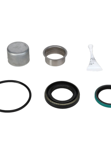 The AGCO | SEAL KIT - AG715838 is an automotive wheel bearing seal kit featuring a metal cover, seal rings, a bushing, and a small tube of lubricant. Crafted from the highest quality materials to meet AGCO Equipment standards, this kit ensures durability and performance.
