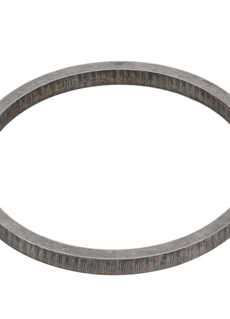 The AGCO | Spacer - Acp0511450 is a thin metal ring with a slightly textured surface. No detailed product description is currently available for this item.