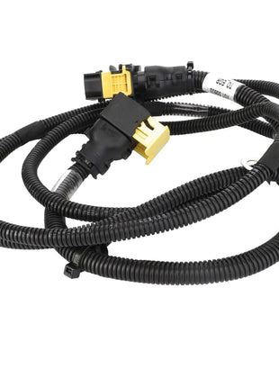 A black coiled wiring harness with connectors, featuring a yellow plug and various plastic housings, lay outstretched on a white background. The product is identified as "AGCO | Jumper, Egr - Acx2929270" by the brand AGCO. Currently, no product description information is available for this item.