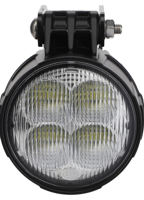 The AGCO Work Lamp - Acw400954A is a round LED work light featuring a black housing and a clear lens, mounted on a sturdy metal bracket with a bolt.