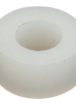 A white cylindrical item with a central hole, resembling a spacer or washer, is shown isolated on a white background. This product is the AGCO | Spacer - Acp0246540 by AGCO. Currently, no additional description is available.