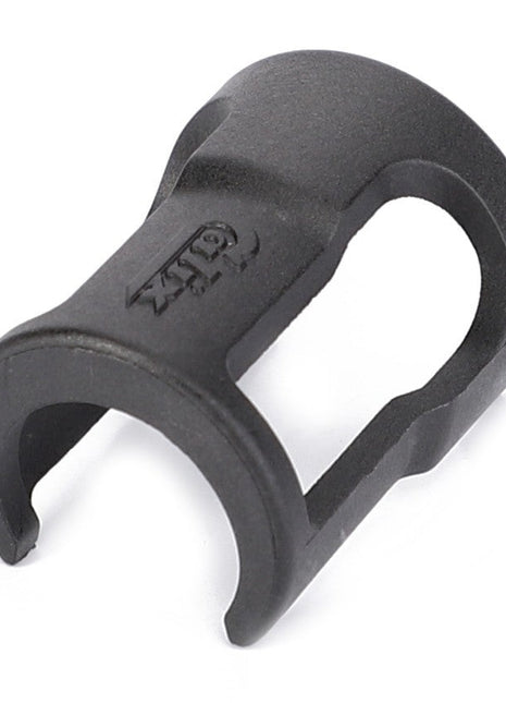 The AGCO Lock - V835340079 is a sleek black plastic clip-on component featuring open sides and a smoothly curved base.