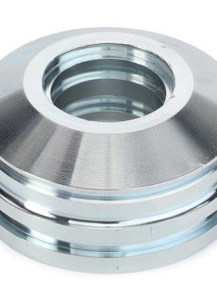 Image of an AGCO GUIDE BUSH - F924860030010, a circular metal part featuring a central hole and grooved surface, resembling a mechanical component or gasket. No current product description information is available for further details.