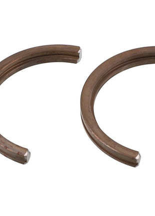 Two AGCO SNAPRING - AG725292 bronze-colored, C-shaped metal pieces are placed side by side on a white background. No current product description information is available.