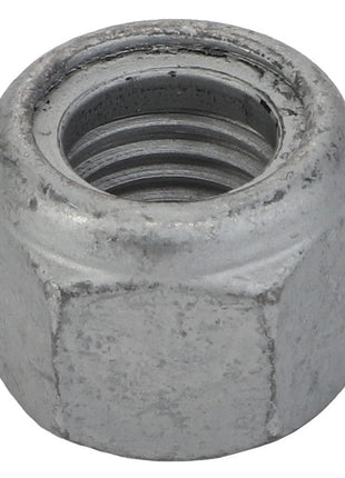 A close-up view of the AGCO | Hex Top Lock Nut - Acw8111800 showcasing its precise internal threading.