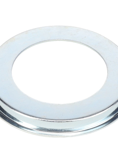 The AGCO | Seal - Acp0000220 is a metallic round washer with a central hole, featuring a slightly raised edge around its outer rim.