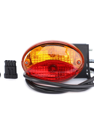 The AGCO Combination Light for the rear right side (Acp0329330), an oval-shaped amber and red taillight with attached wiring, black connector, and rubber boot laid out on a white background, showcases durable quality for optimal illumination as an example of AGCO Genuine Lighting Parts.