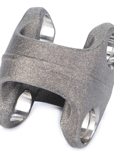 A close-up of the AGCO | Knuckle - 0.010.2513.2, crafted from heat forged steel, featuring two openings on each side and a textured surface for enhanced durability.