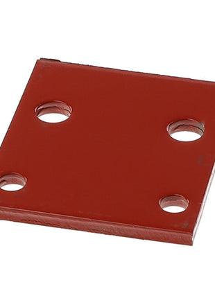 The AGCO Knife Reinforcement - Acx2478170 is a square, red metal plate featuring four circular holes, one near each corner. No current product description information is available.