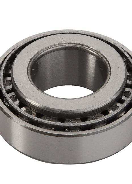 The AGCO Bearing - Acp0234260 is a cylindrical metal roller bearing featuring both an inner and outer ring, expertly engineered by AGCO for reducing friction in rotating parts.