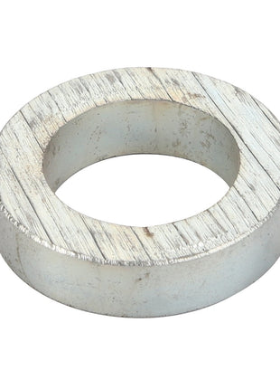 A silver metal washer with a large central hole, displaying some scratches and wear on its surface. No current product description available for AGCO | Spacer - Acp0005780 by AGCO.