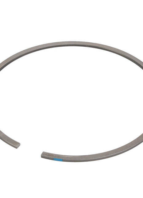 The AGCO Piston Ring - Acp0584620 is a metallic circular ring with a gap on one side, likely designed to improve engine lubrication and manage combustion gases.