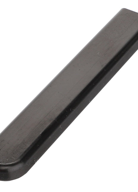 A black, rectangular plastic object with rounded ends, identified as the AGCO Bracket - Acp0383490 by the brand AGCO, lying flat on a white background. No current product description available.