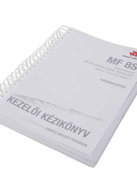 No current product description available. A spiral-bound operator's manual titled "AGCO | Operator's Manual - Act005882B" for Massey Ferguson, featuring sections on tractor maintenance. The cover includes Hungarian text and company branding from AGCO.