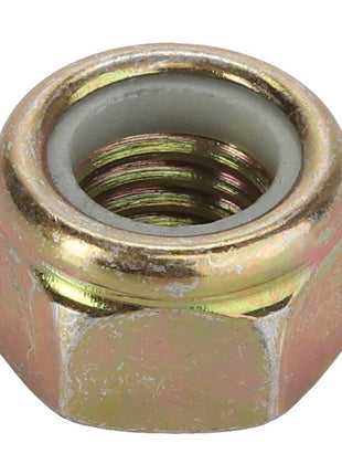 Close-up of an AGCO LOCKNUT - D46150128, featuring a hexagonal metallic design with a threaded interior and a slightly worn exterior.