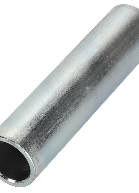 AGCO’s SPACER - D28280489, a cylindrical metal pipe with a hollow interior and a smooth exterior surface, is artistically positioned diagonally against a pristine white background.