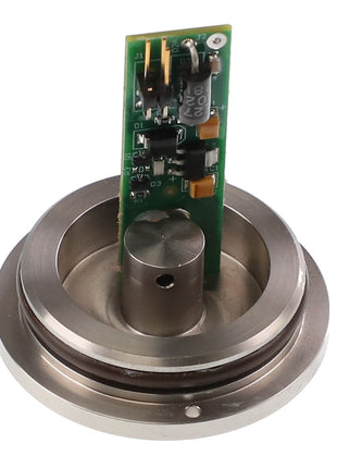 A sleek, circular metallic part featuring an attached vertical green circuit board, known as the AGCO BEARING ASSY - AG724793.