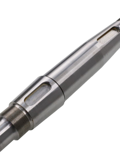 The AGCO PTO Shaft - ACW0565070 is a metallic cylindrical machine part featuring a threaded end and grooved sections. Product description information is currently unavailable.