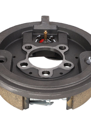 Introducing the AGCO | Brake, Left Hand - Acw1528850: A robust black mechanical component with a circular design, incorporating multiple holes and an internal gear system. Ideal for integration into larger machinery or vehicles, this high-quality part is designed to meet the demanding standards of AGCO.