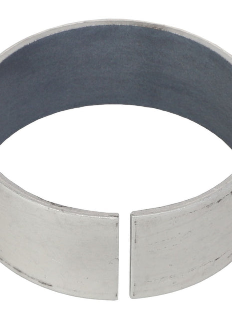 The image displays AGCO's BUSH - CH108-6075, a sleek, silver, open-ended metallic band with a smooth surface, presented in a slightly angled top-down view.